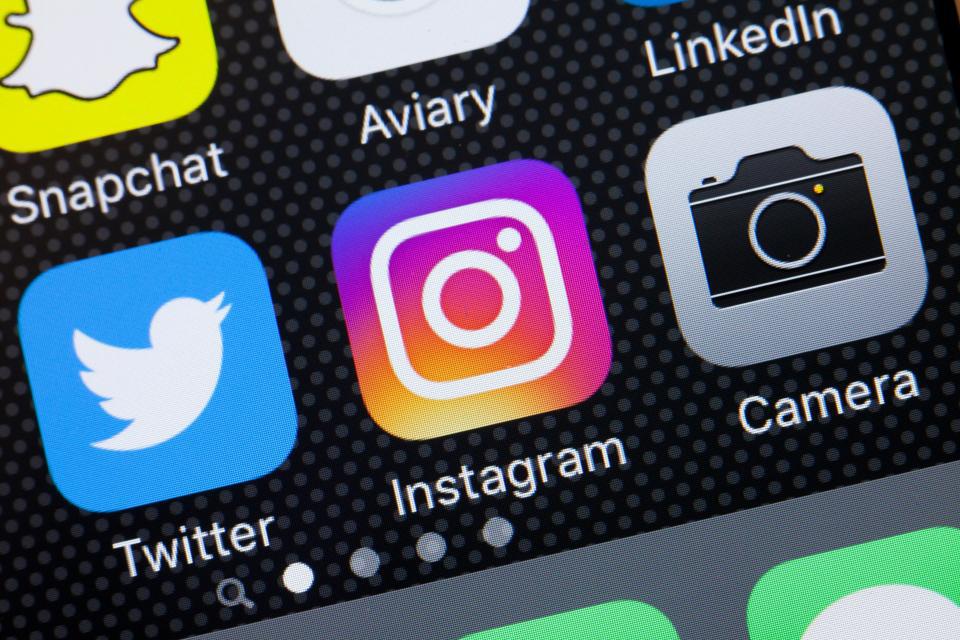 Instagram, Twitter & Snapchat apps on an iPhone